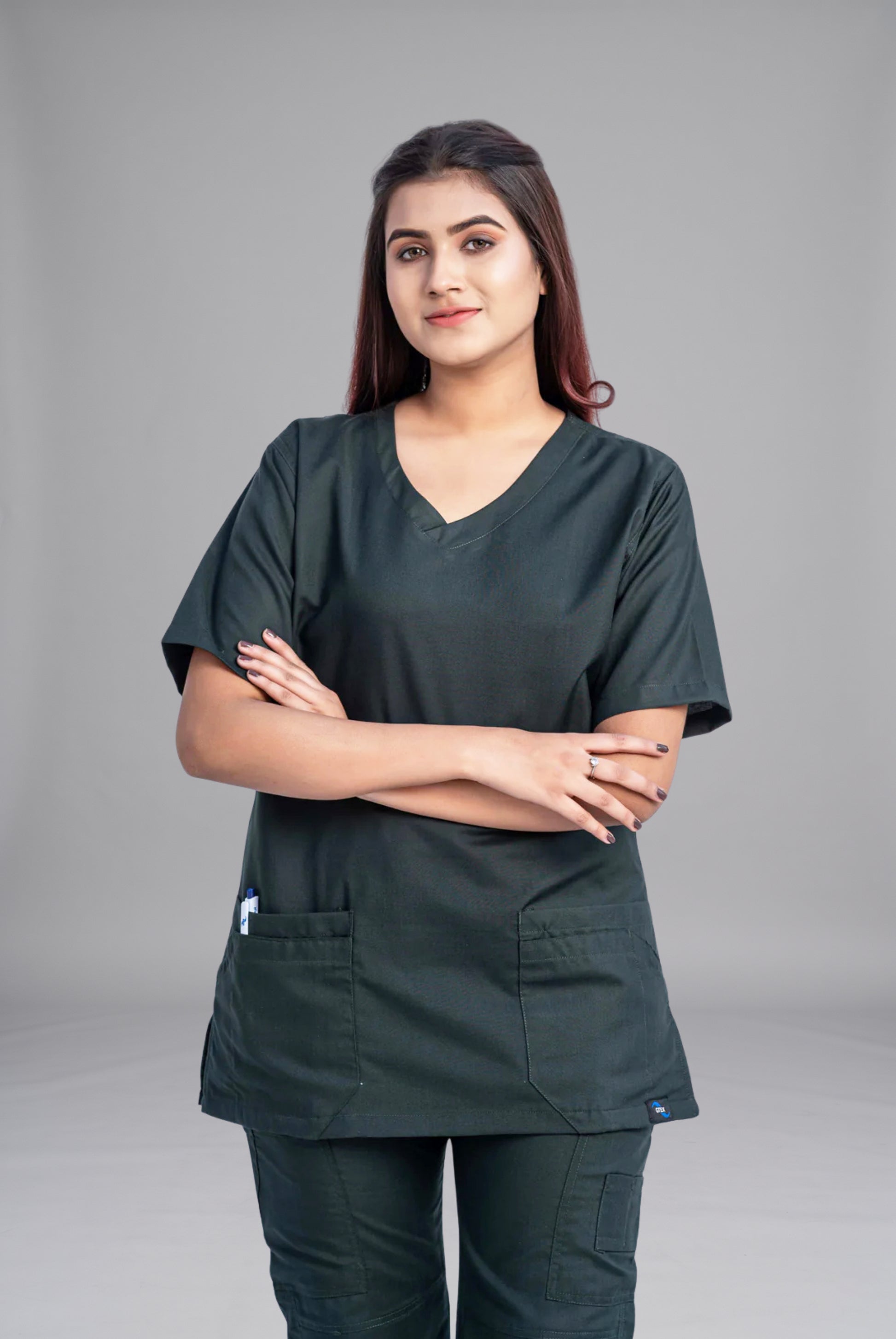 Buy Classic Curve™ bottle green scrub for women in Pakistan by Gtex Apparels, designed for comfortable daily professional use in healthcare environments  2