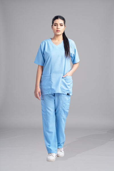 Classic Curve™ dusk blue scrub for women by Gtex Apparels in Pakistan, designed for practical healthcare work environments 1