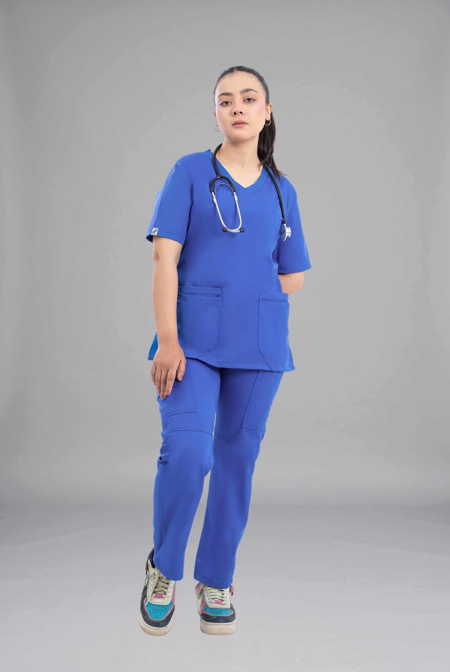 Buy Classic Curve royal blue scrub for women in Pakistan by Gtex Apparels, designed for comfortable daily professional use in healthcare environments 2