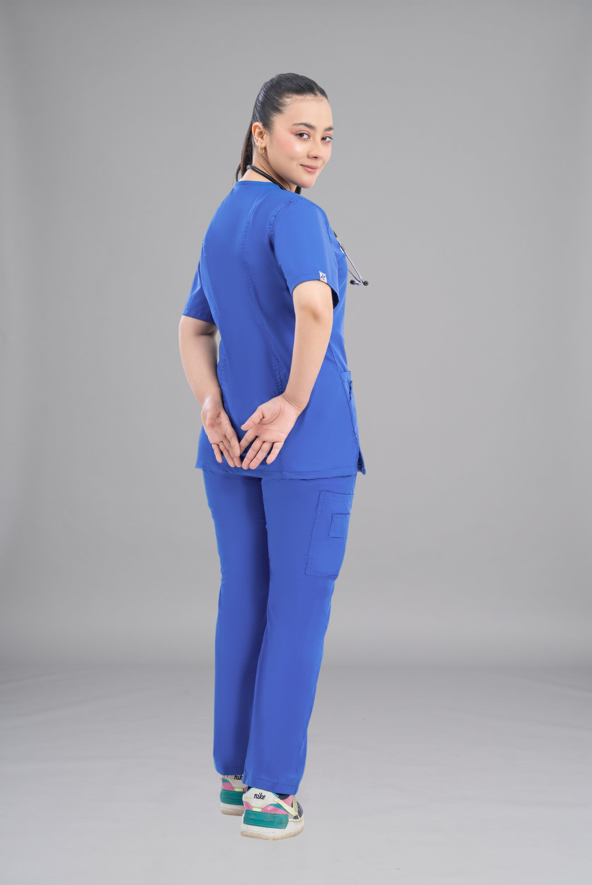 Buy Classic Curve royal blue scrub for women in Pakistan by Gtex Apparels, designed for comfortable daily professional use in healthcare environments 5