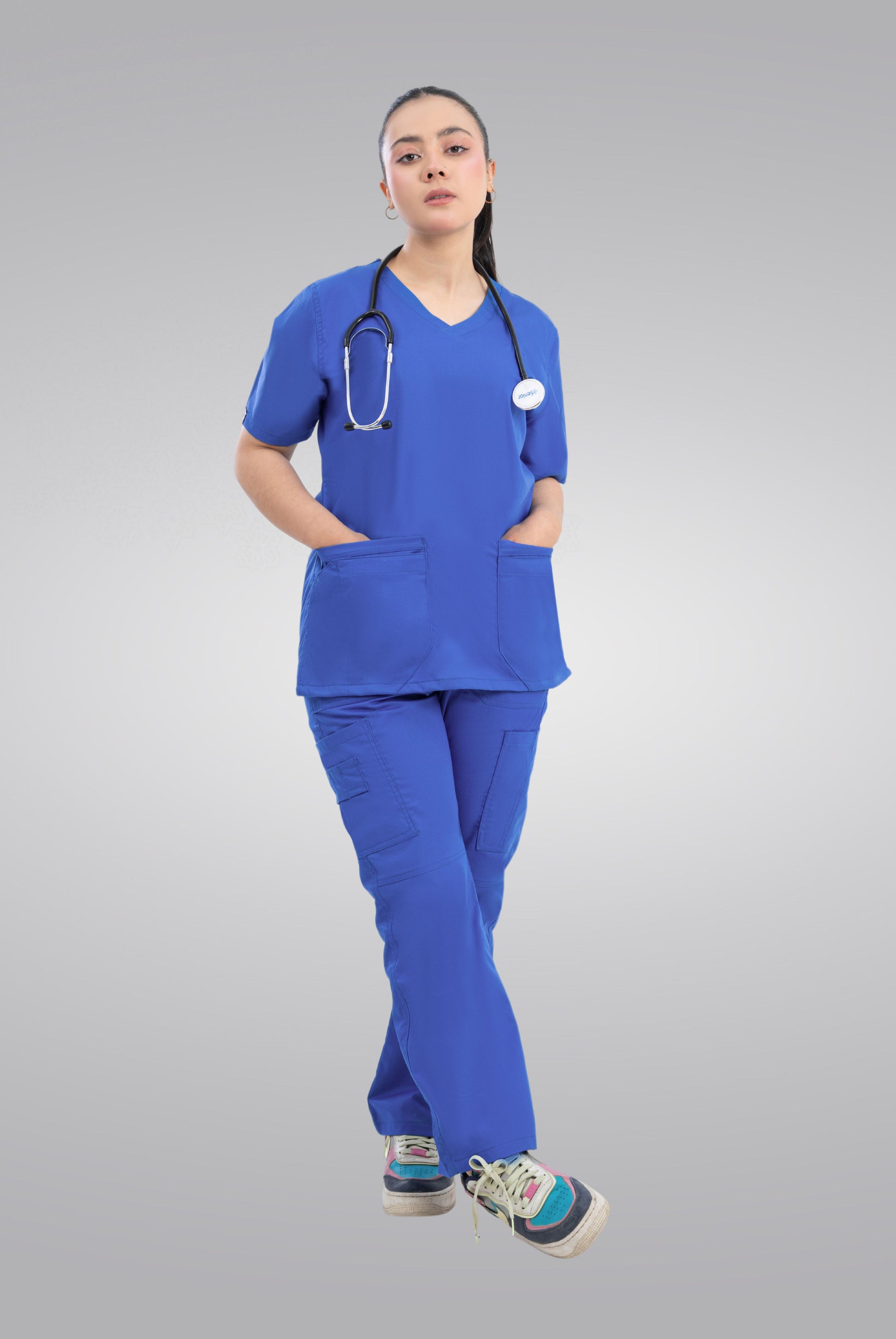 Buy Classic Curve royal blue scrub for women in Pakistan by Gtex Apparels, designed for comfortable daily professional use in healthcare environments 1