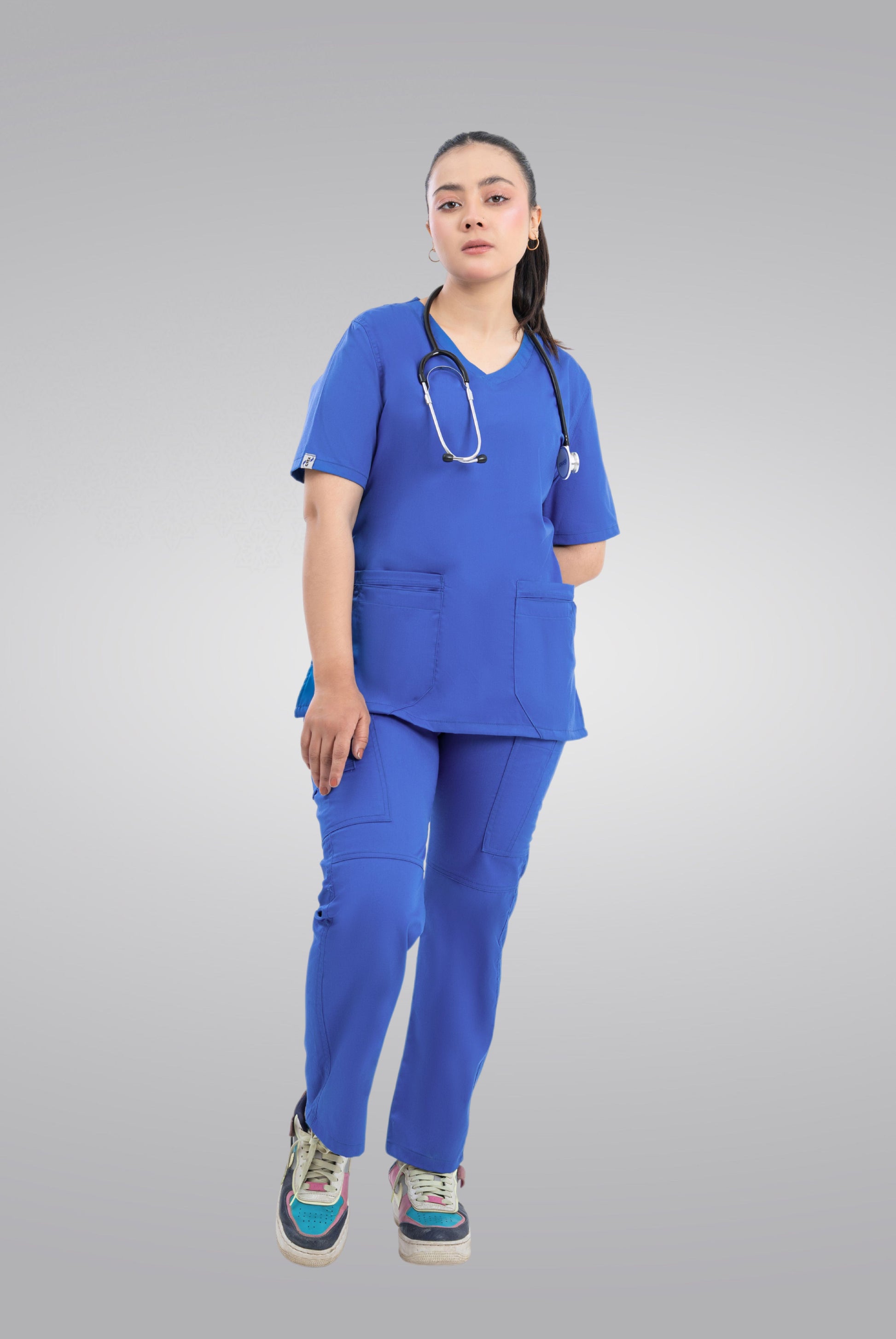 Buy Classic Curve royal blue scrub for women in Pakistan by Gtex Apparels, designed for comfortable daily professional use in healthcare environments 2
