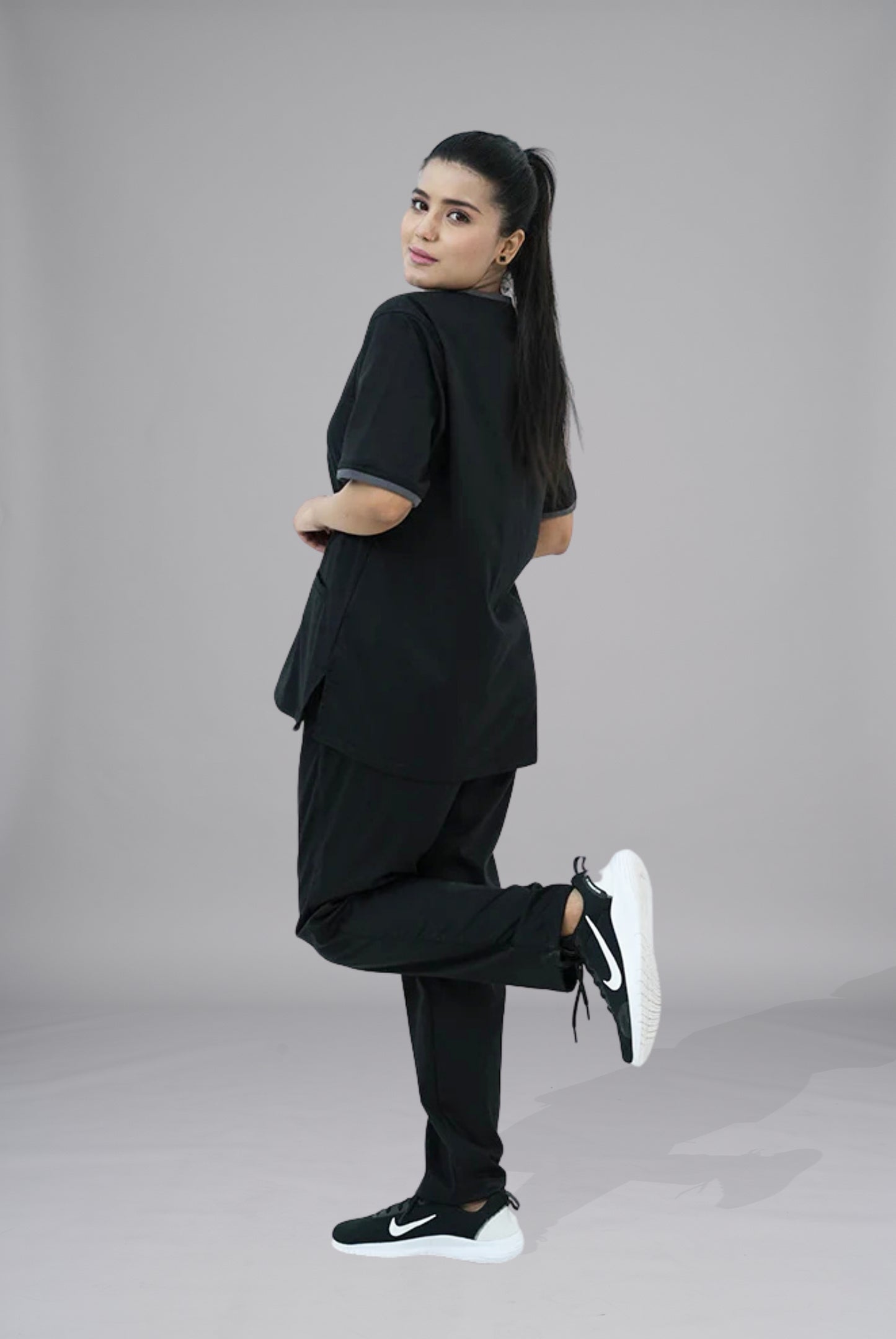 Buy Elite Notch black scrub in Pakistan by Gtex Apparels suitable for healthcare professionals requiring durable everyday workwear  3