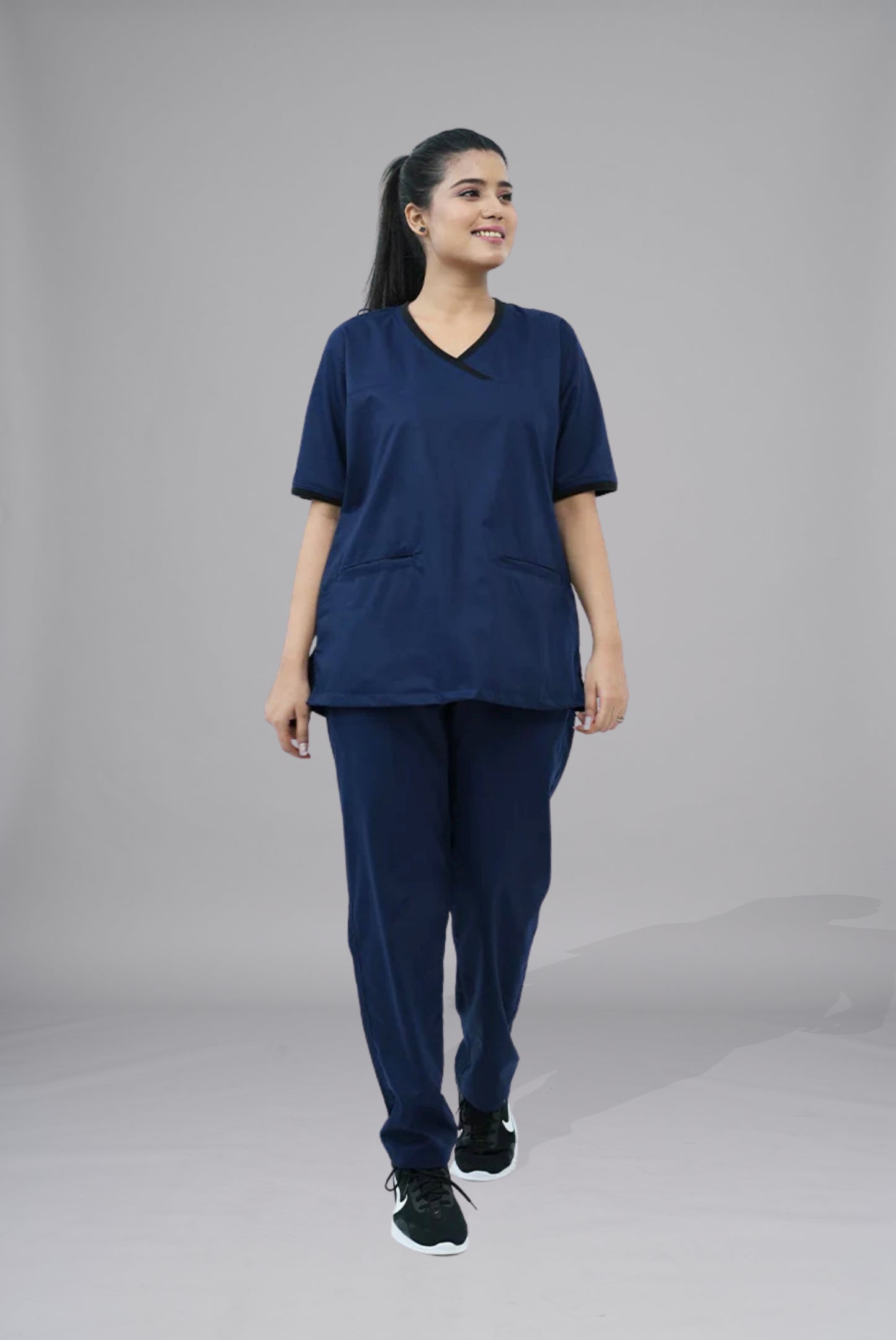 Shop Elite Notch™ Ink Navy Scrub for Women at GTEX Apparels. Comfortable, durable, and breathable scrubs perfect for healthcare professionals with easy returns.2