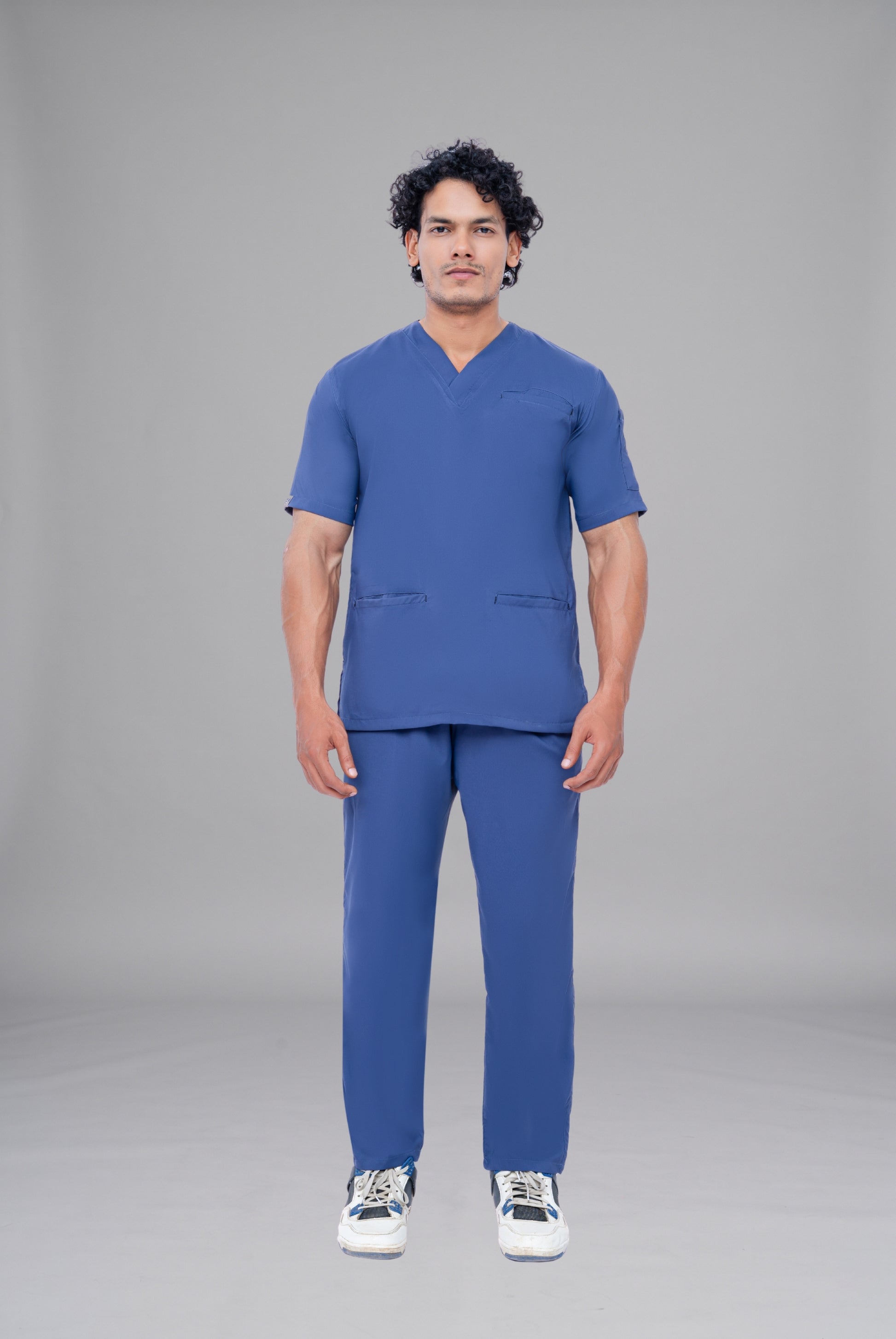 Buy Flexi Care Edge Line™ light navy scrub for unisex in Pakistan by Gtex Apparels, designed for comfortable daily professional use in healthcare environments 1