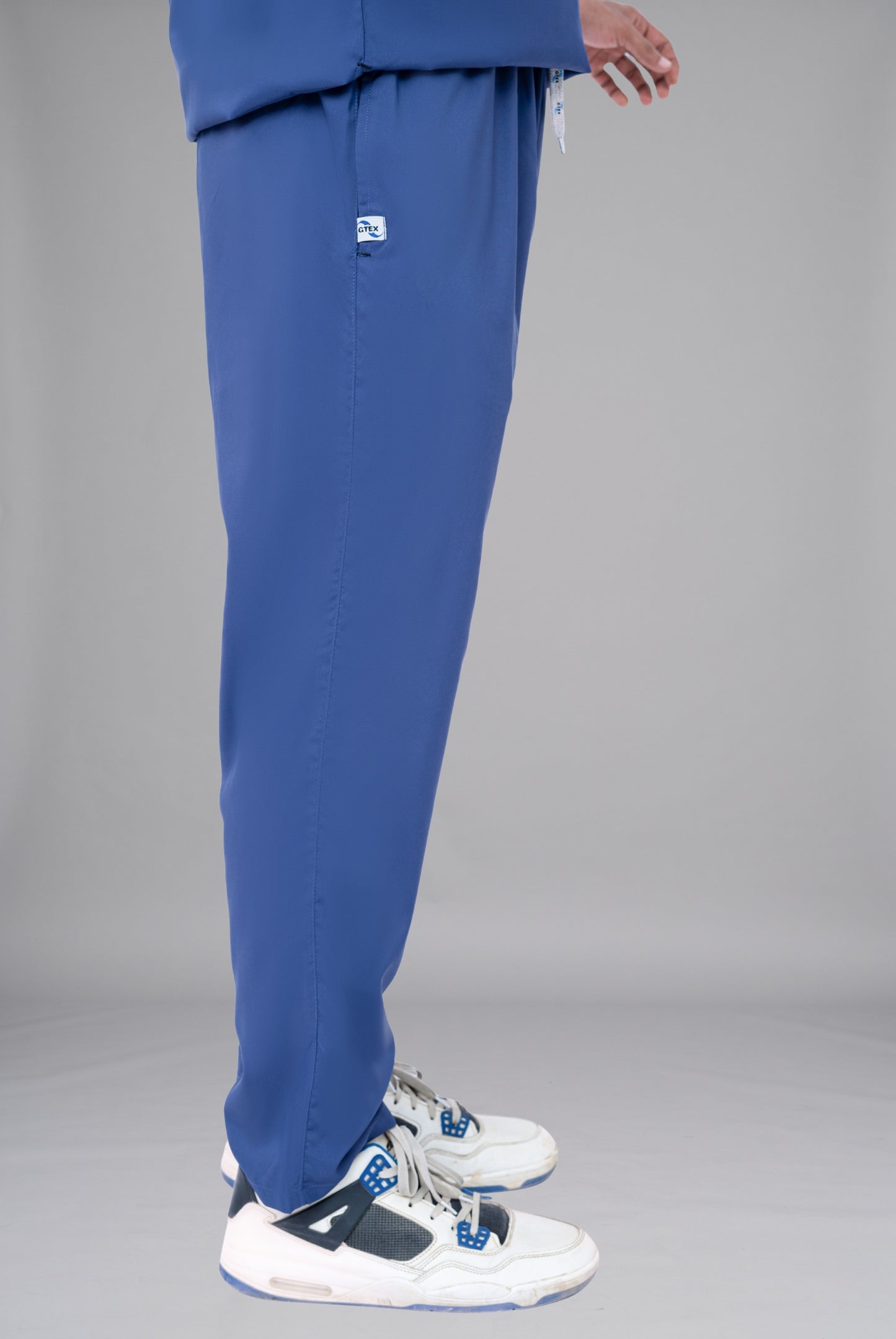 Buy Flexi Care Edge Line™ light navy scrub for unisex in Pakistan by Gtex Apparels, designed for comfortable daily professional use in healthcare environments 3