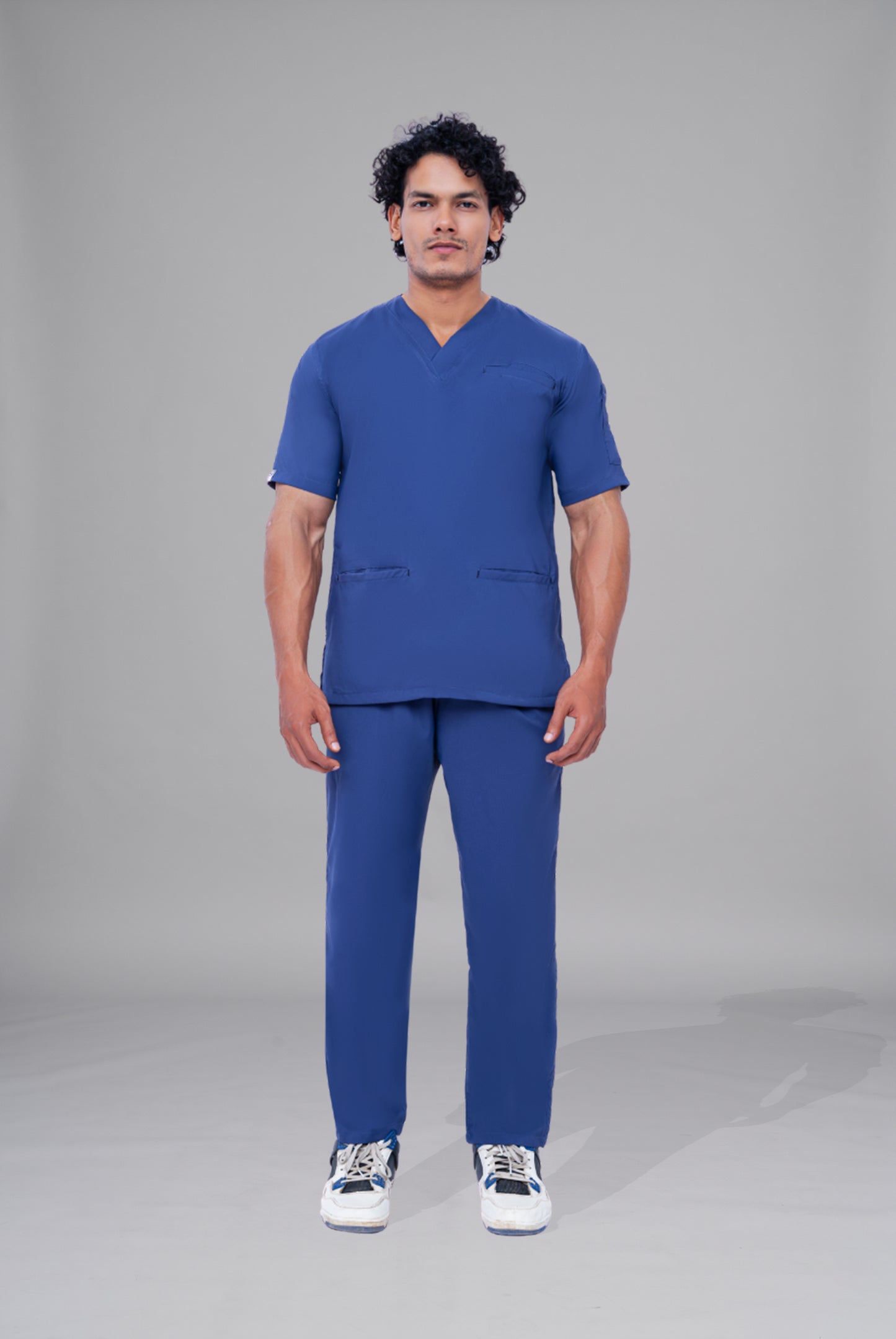 Buy Flexi Care Edge Line™ light navy scrub for unisex in Pakistan by Gtex Apparels, designed for comfortable daily professional use in healthcare environments 1