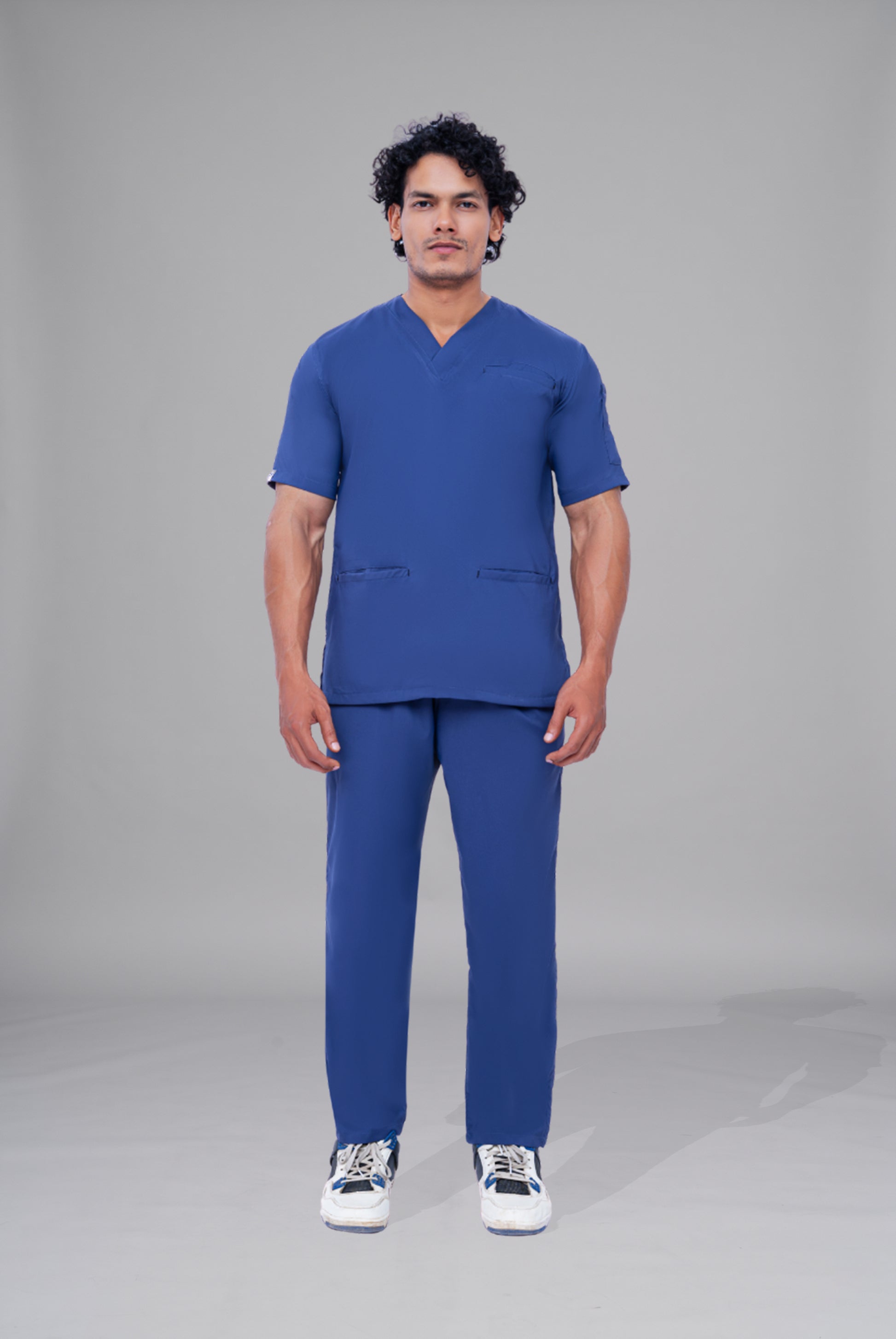 Buy Flexi Care Edge Line™ light navy scrub for unisex in Pakistan by Gtex Apparels, designed for comfortable daily professional use in healthcare environments 1