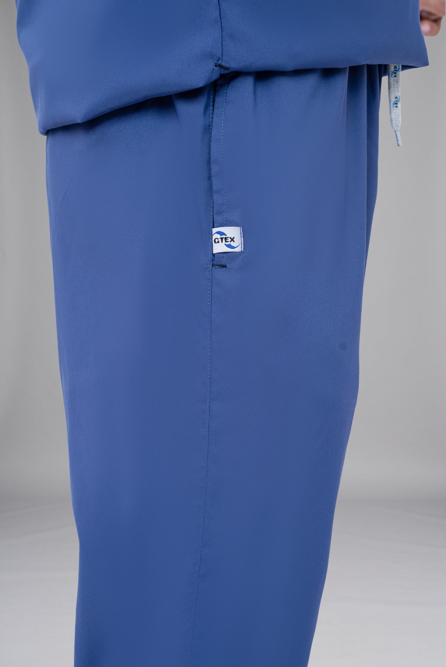 Buy Flexi Care Edge Line™ light navy scrub for unisex in Pakistan by Gtex Apparels, designed for comfortable daily professional use in healthcare environments 6
