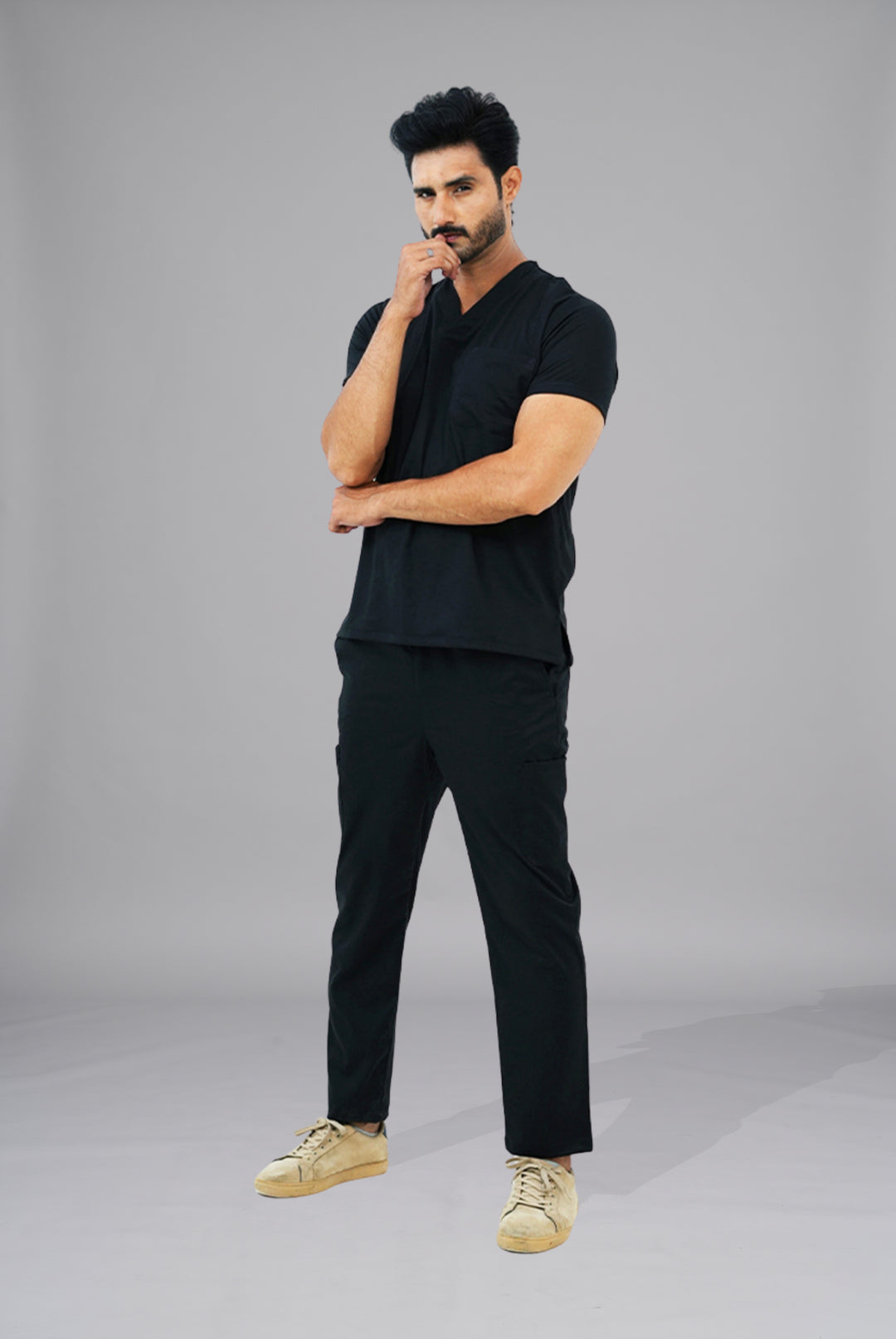 Premium Notch Pro black scrub by Gtex Apparels in Pakistan designed for practical healthcare work environments 3