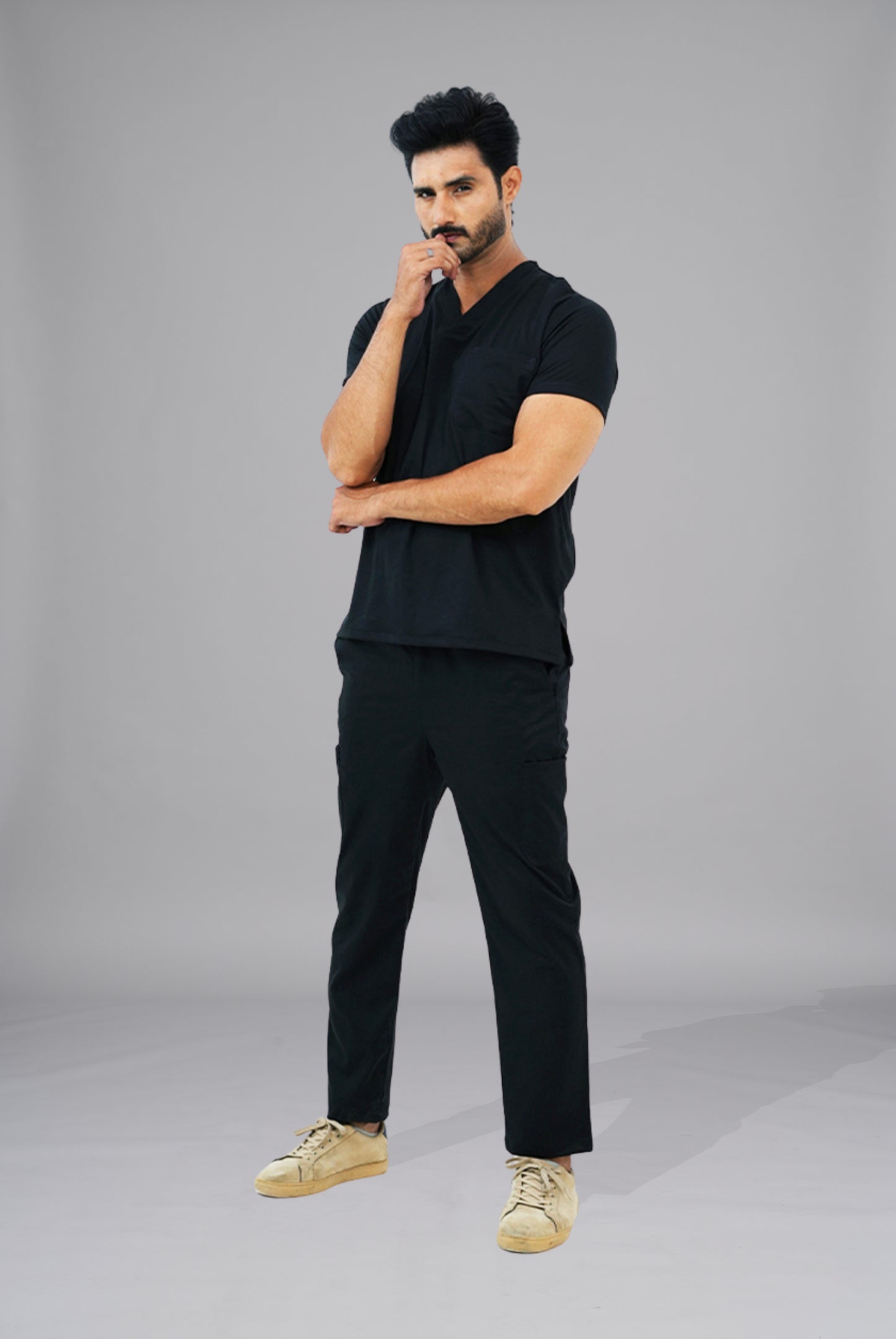 Premium Notch Pro black scrub by Gtex Apparels in Pakistan designed for practical healthcare work environments 3