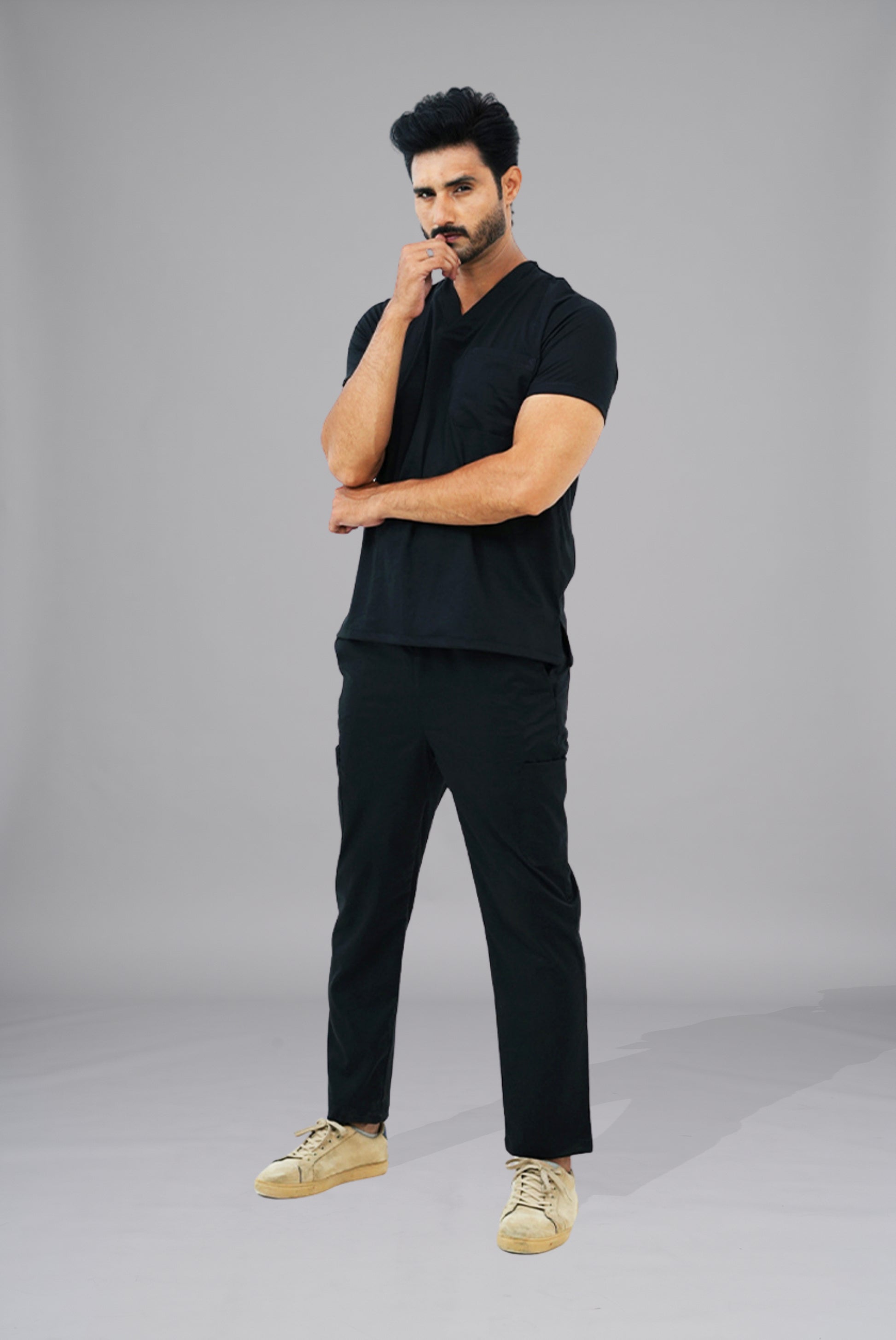 Premium Notch Pro black scrub by Gtex Apparels in Pakistan designed for practical healthcare work environments 3