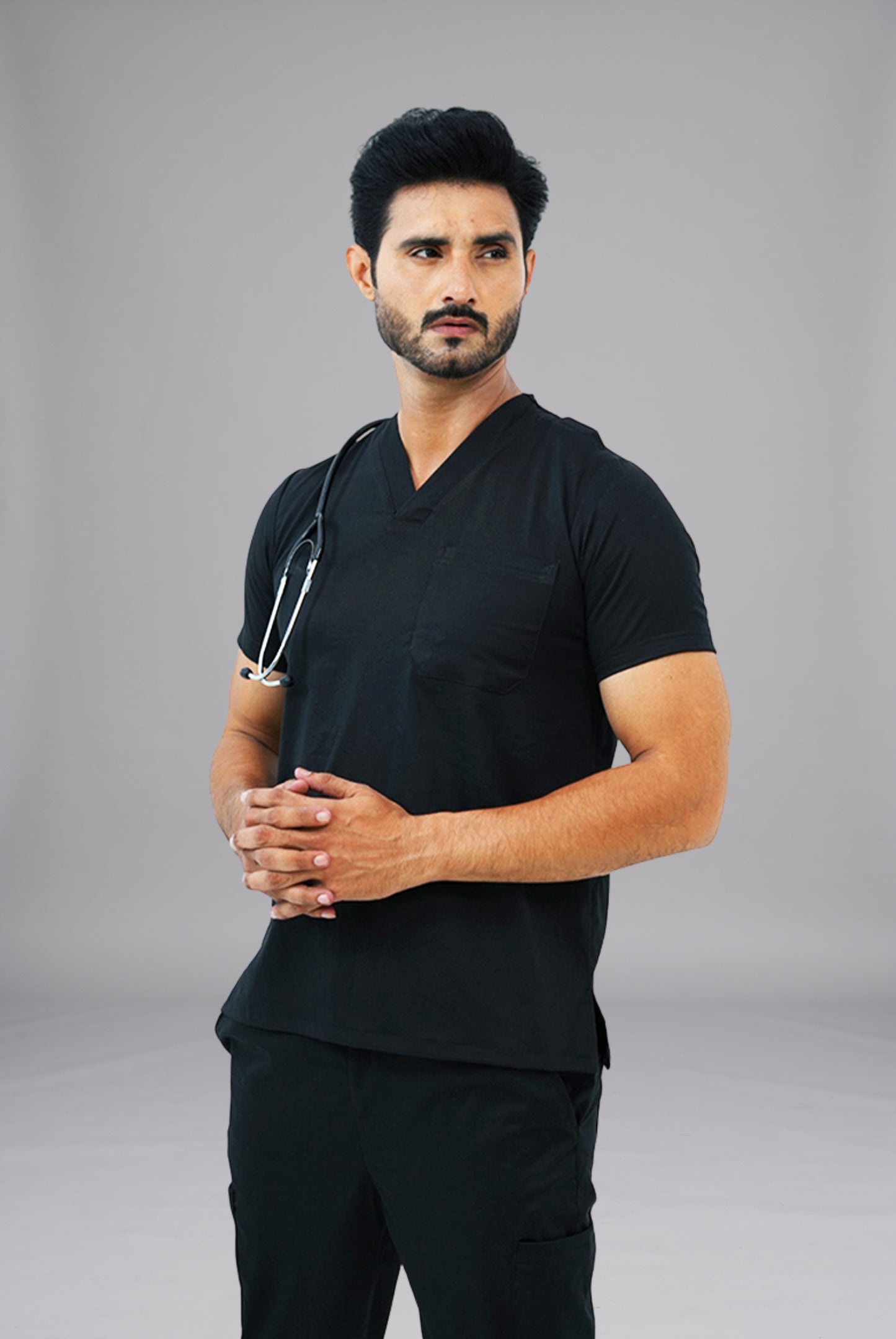 Premium Notch Pro black scrub by Gtex Apparels in Pakistan designed for practical healthcare work environments 5