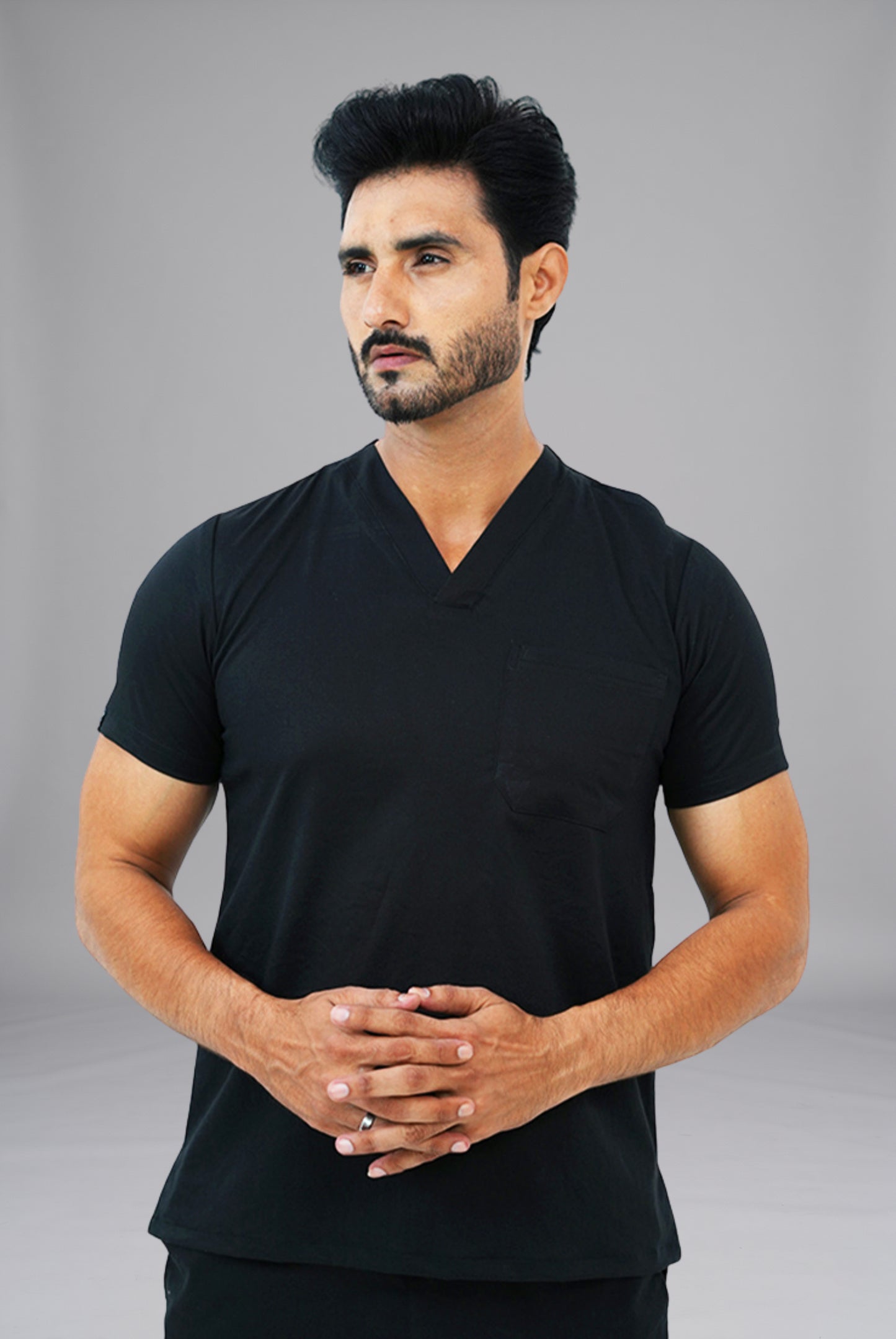 Premium Notch Pro black scrub by Gtex Apparels in Pakistan designed for practical healthcare work environments 6