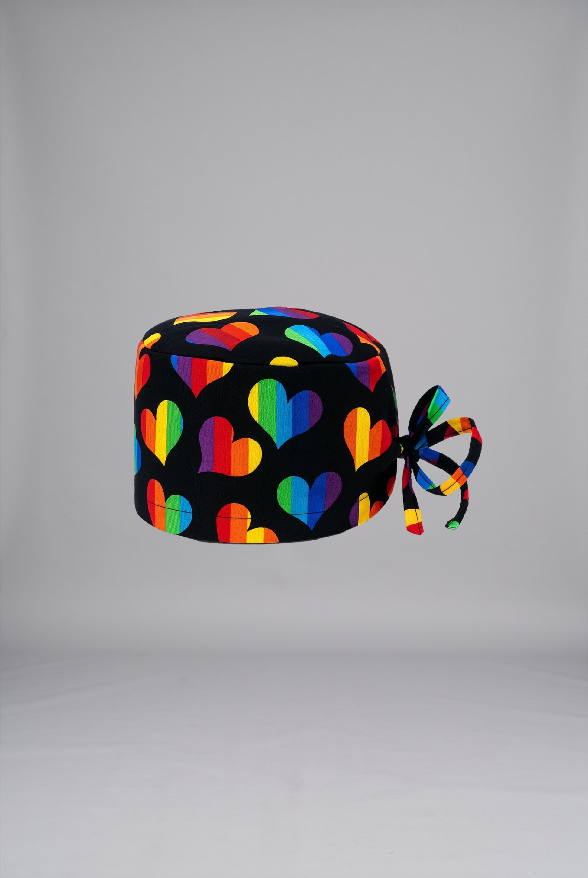 Rainbow Hearts Printed Surgical Cap | GTEX Apparels Pakistan – Comfortable and Breathable Medical Surgical Cap with a Colorful Rainbow Hearts Print, Designed for Doctors, Nurses, Surgeons, and Healthcare Professionals for Daily Use in Hospitals and Clinics. 1