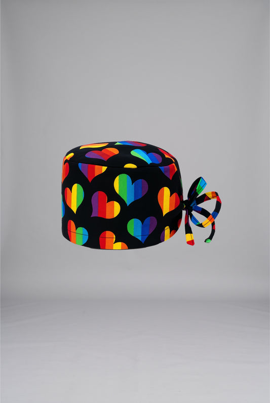 Rainbow Hearts Printed Surgical Cap | GTEX Apparels Pakistan – Comfortable and Breathable Medical Surgical Cap with a Colorful Rainbow Hearts Print, Designed for Doctors, Nurses, Surgeons, and Healthcare Professionals for Daily Use in Hospitals and Clinics. 1