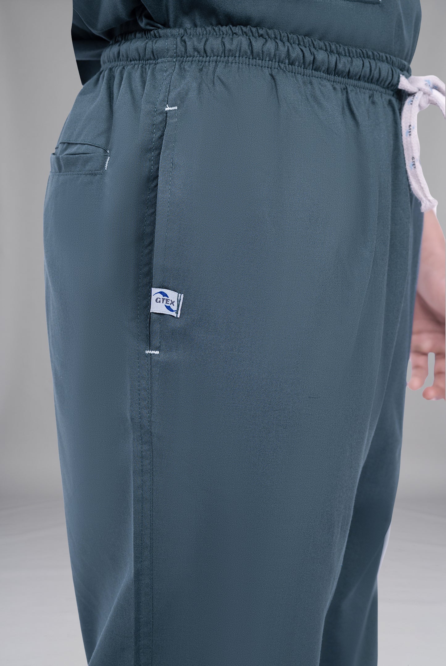 Buy Teal Steel Edge Line scrubs for unisex in Pakistan by Gtex Apparels, comfortable workwear for daily use 6